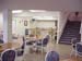 View from dining area into breakfast bar and stairs